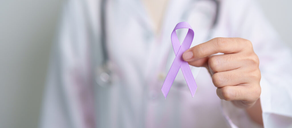 Doctor with purple ribbon for esophageal cancer awareness